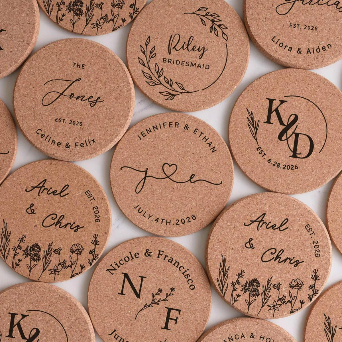 Personalized round-edge cork coasters engraved with names, initials and wedding dates