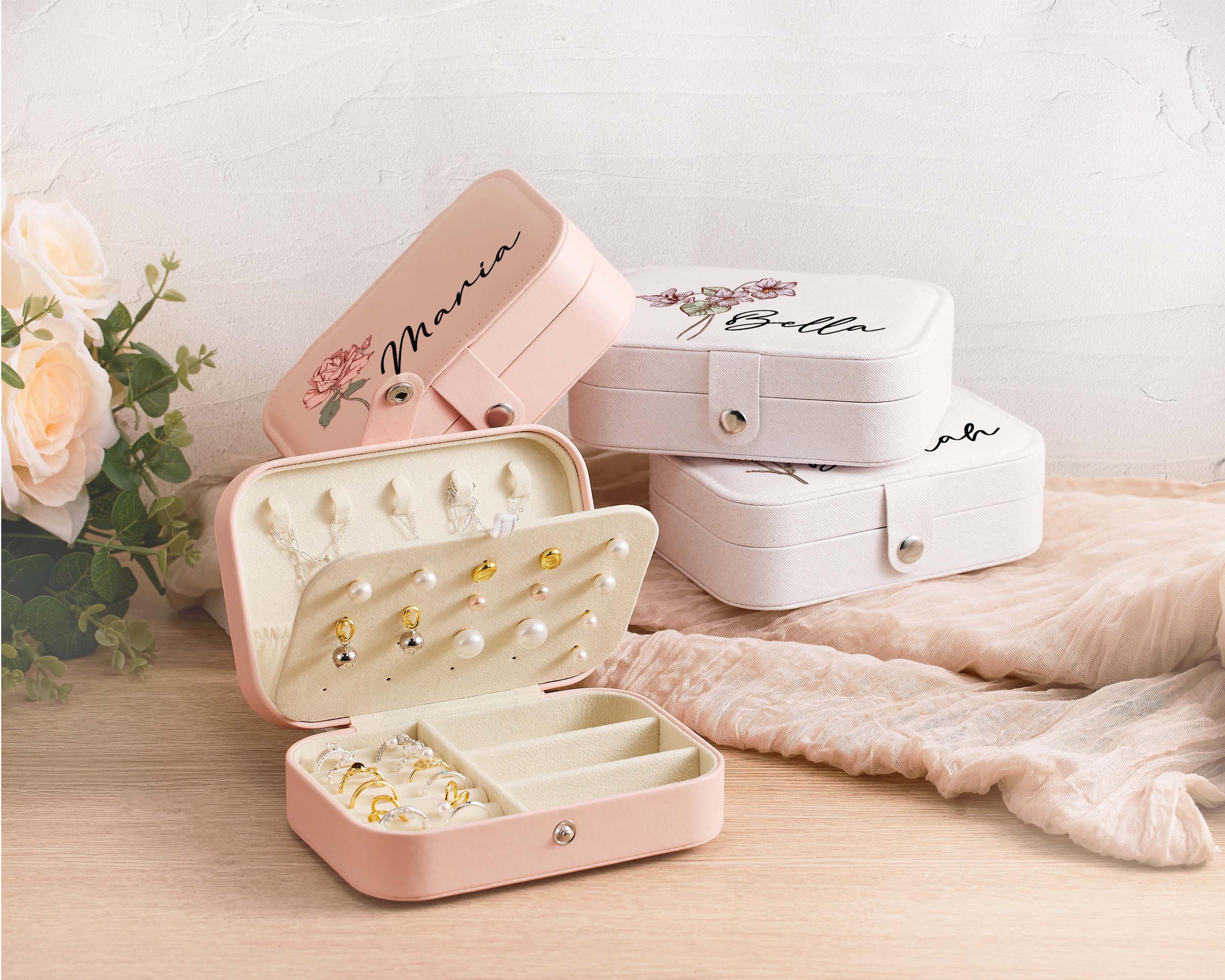 a couple of pink boxes sitting on top of a table