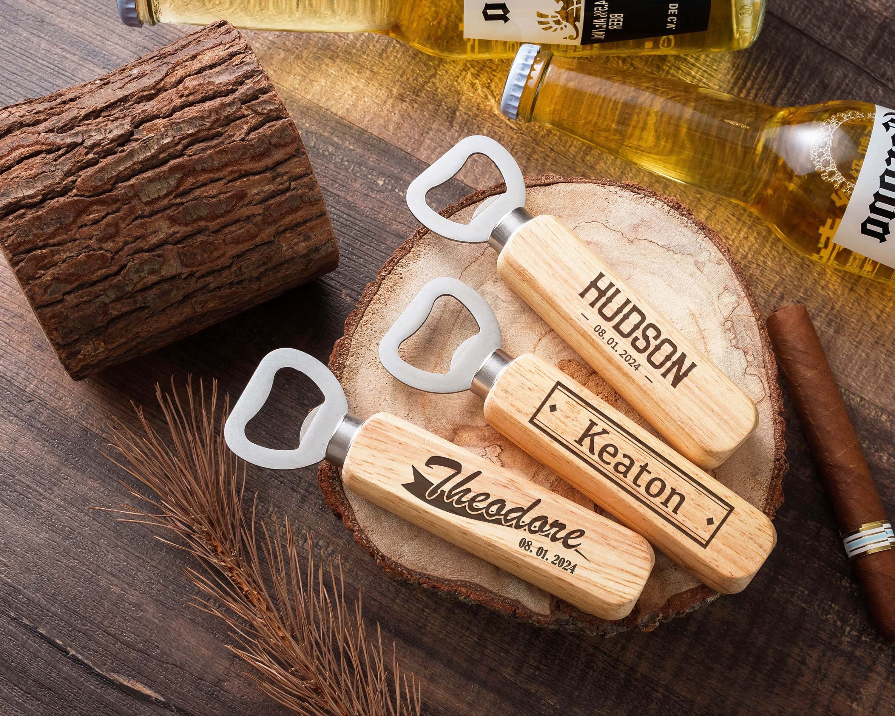 a couple of bottle openers sitting on top of a wooden table