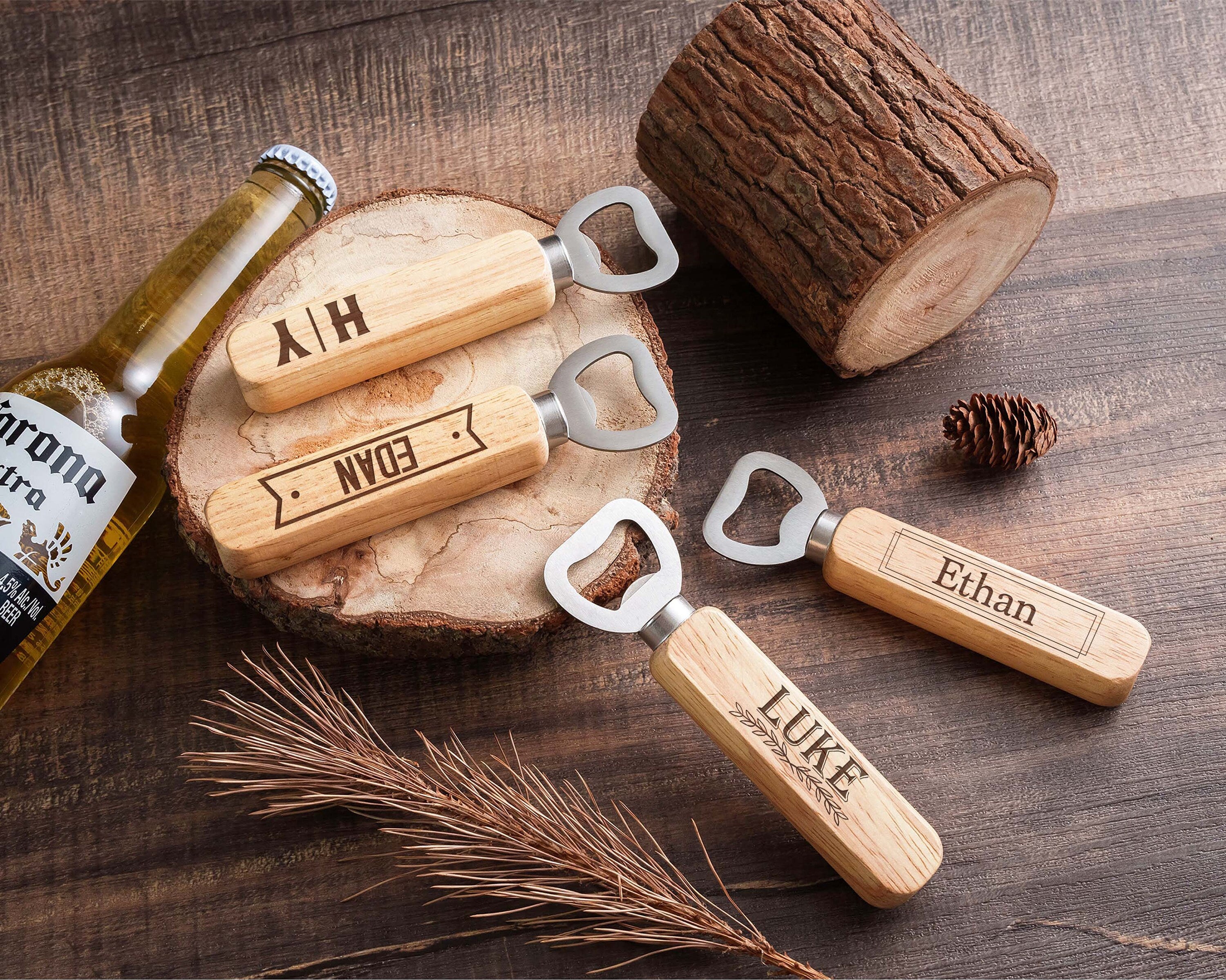 a bottle opener with a couple of wine openers on it