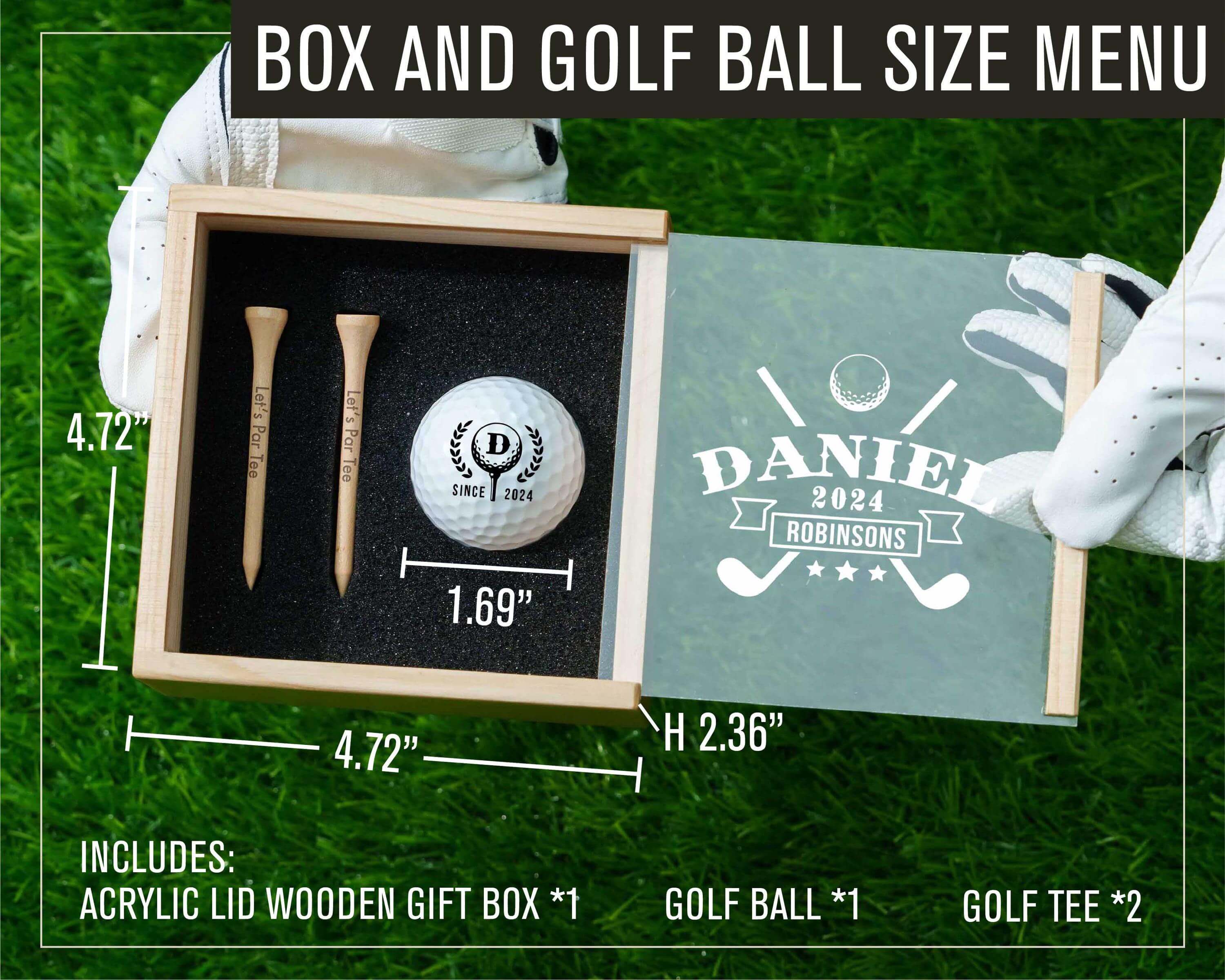 a box with a golf ball, tees, and ball marker