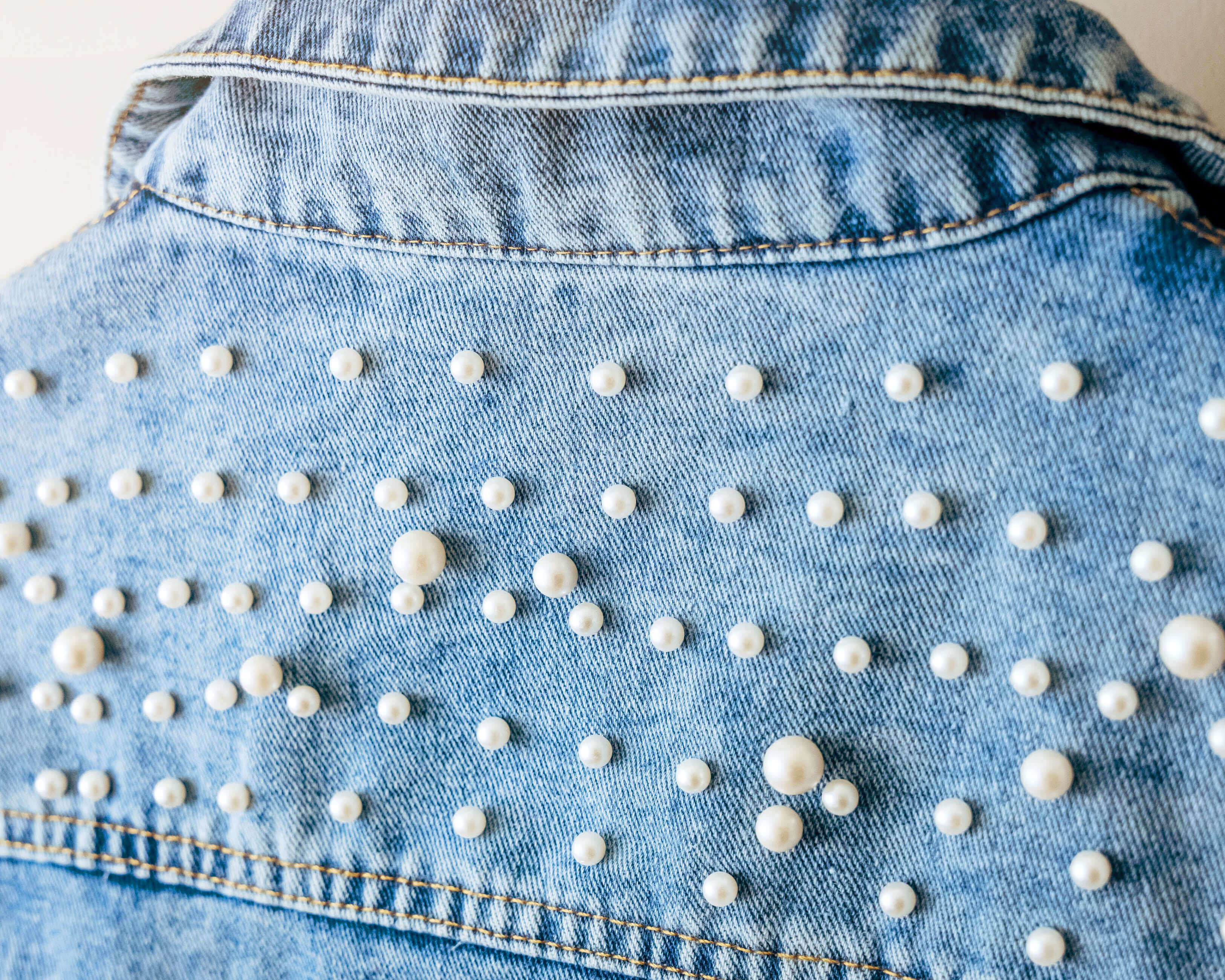 Add a touch of glamour to your bridal look with our custom bride jean jacket that feature beautiful pearl designs.