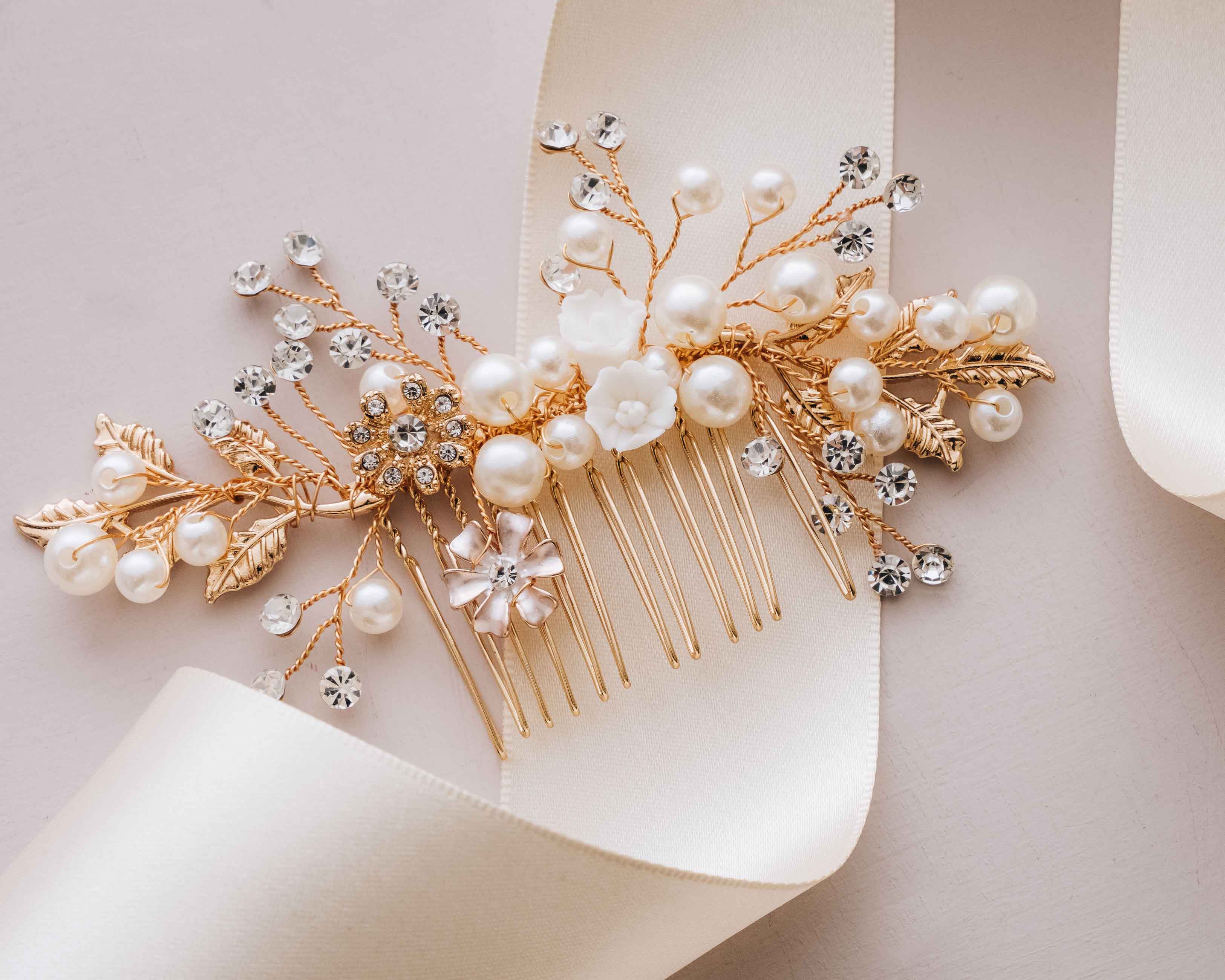 A close-up view of the Bridal Hair Comb, highlighting its intricate pearl and crystal details.