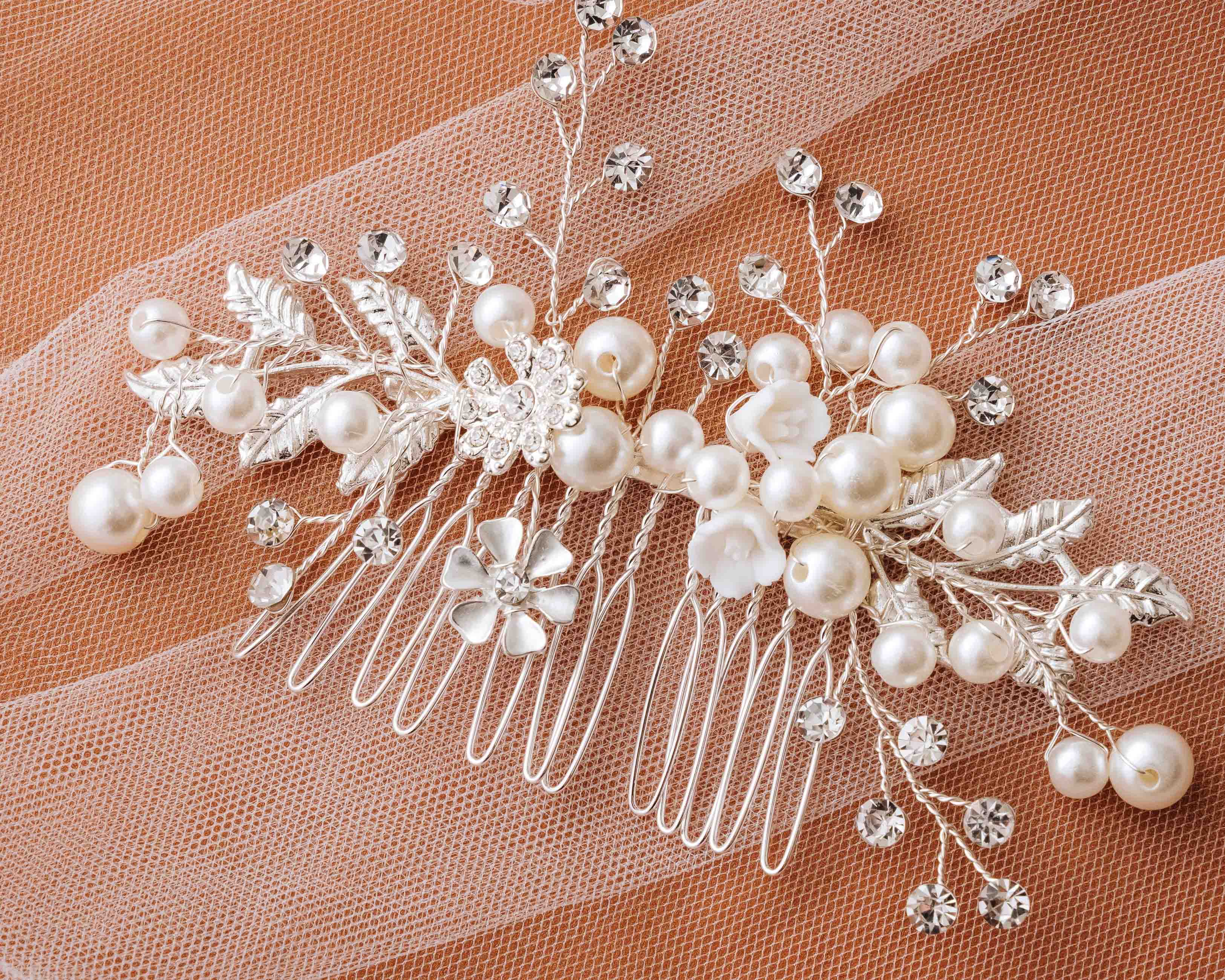 A close-up view of the Bridal Hair Comb, highlighting its intricate pearl and crystal details.