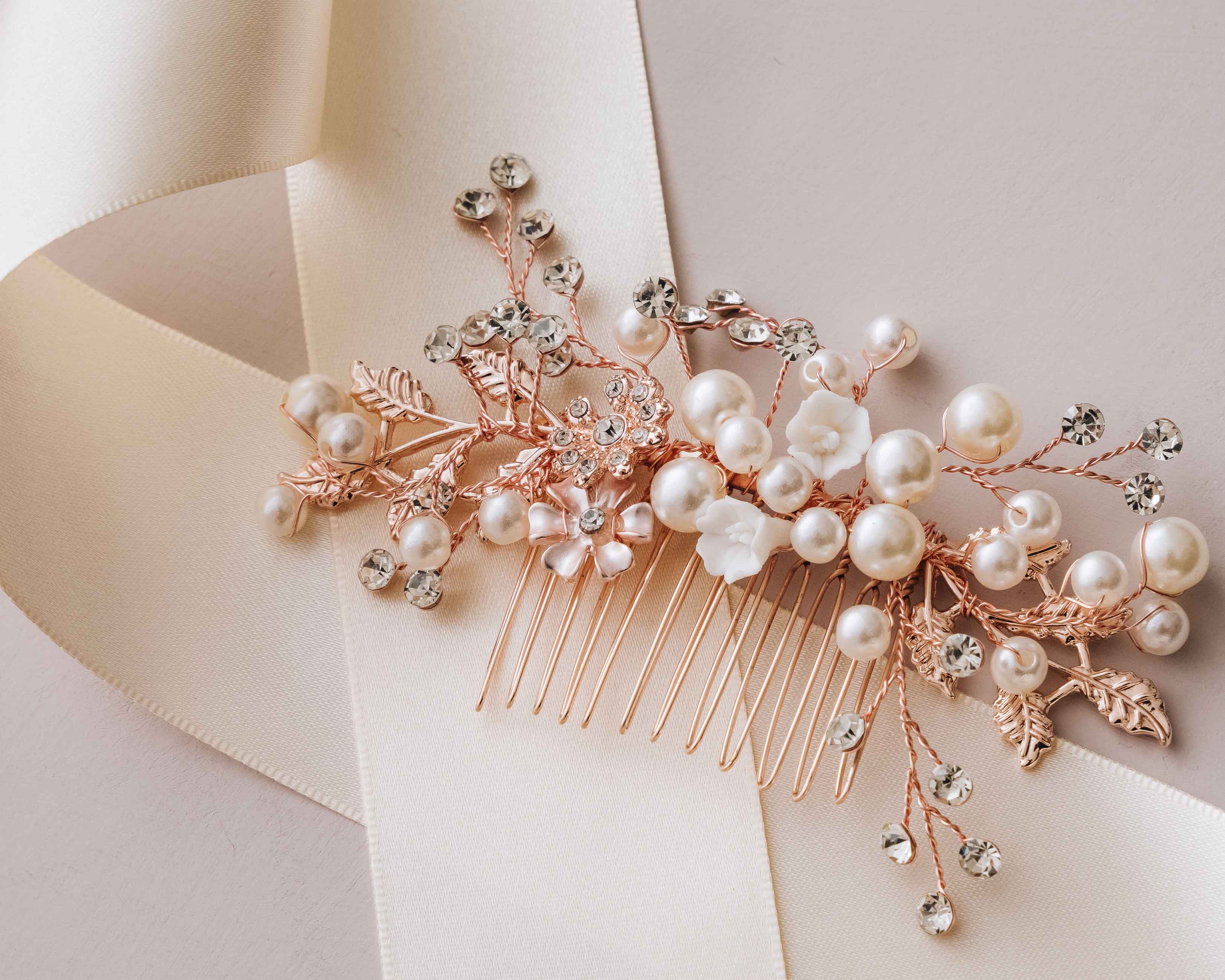 A close-up view of the Bridal Hair Comb, highlighting its intricate pearl and crystal details.